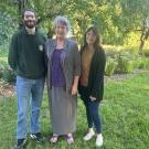  Zeke Spooner (left), recipient of the 2025 Alexeeff Award, stands with Jean Ackerman (center), spouse of the late Dr. George Alexeeff, and Dr. Christina Pasparakis (right) in a garden setting following the award ceremony.